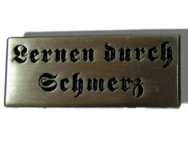 Anstecker "Lernen durch Schmerz"
